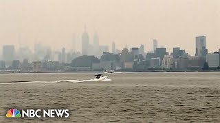 New York City afternoon skies get an orange tinge due to Canadian wildfires