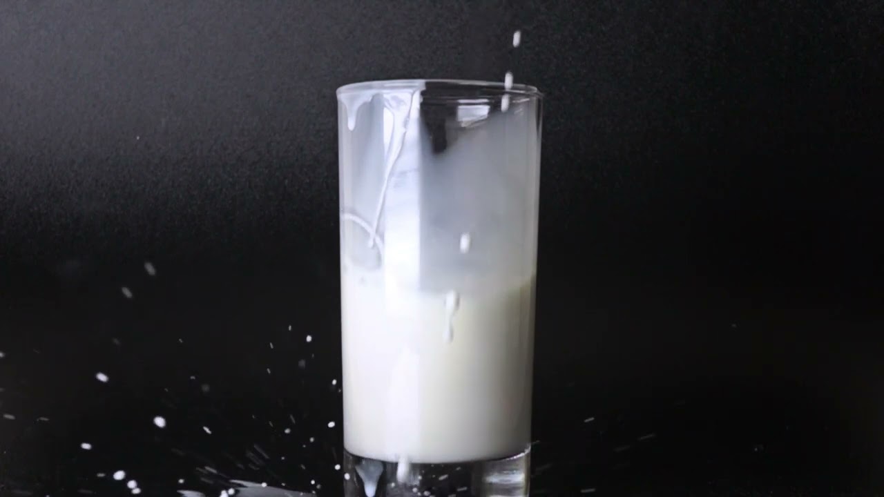 pouring milk into glass