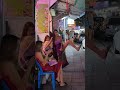 funny Massasge Girl performing on the street in Patong, Thailand 2023