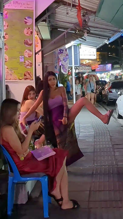 funny Massasge Girl performing on the street in Patong, Thailand 2023