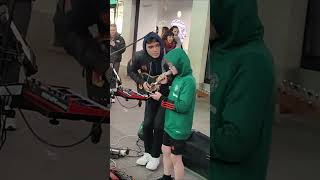 This KID WOWS &amp; STEALS The CROWD! #busking #guitar #singer #shorts