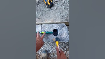 Leveling A Base Block #retainingwall  #hardscape #landscaping