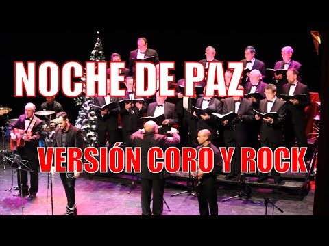 Noche de paz villancico interpretado por banda de rock y coro de voces graves