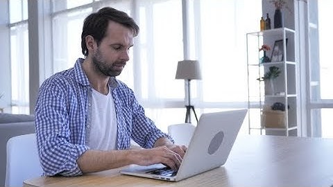 Casual Beard Man Working On Laptop in Office (Stock Footage)