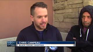 Shoppers brave the cold in all out battle for bargains on Black Friday