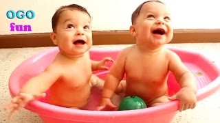TWIN BABY BATHTIME - Babies discover the Bath for the first time. Cute KIDS