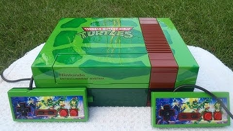 Custom NES Nintendo TMNT themed with airbrushed turtle shell, 2 matching controls.