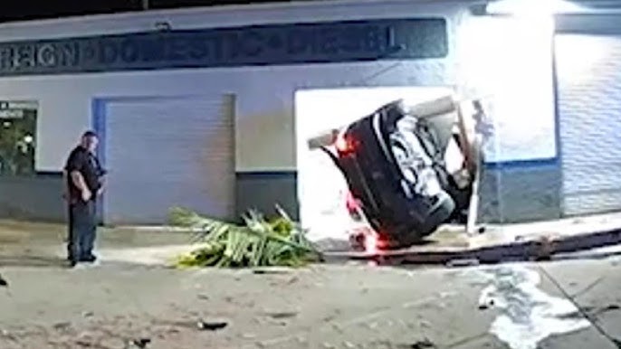 Car Does Multiple Flips Before Crashing Into Auto Shop Cops