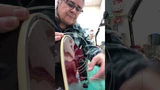 Trick to feed the string thru the body grommets