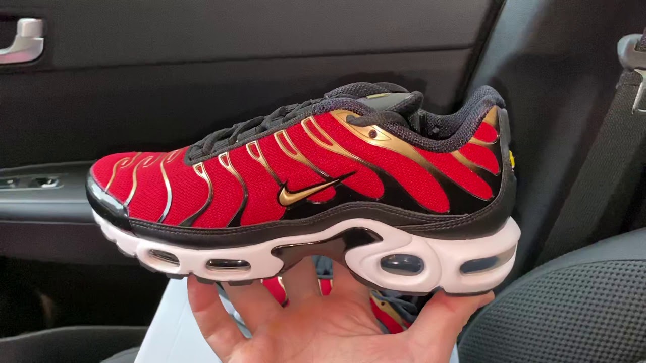 red black and gold air max plus