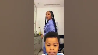 Lil baby's son stopping his mum from shaking her booty to the world.