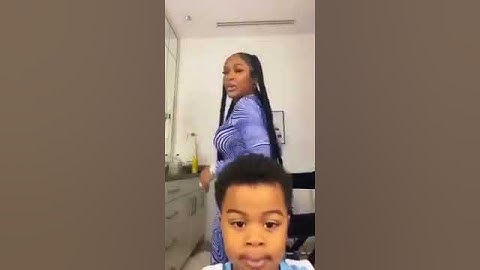 Lil baby's son stopping his mum from shaking her booty to the world.