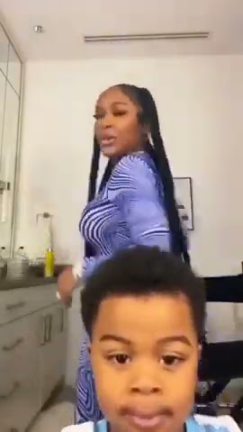 Lil baby's son stopping his mum from shaking her booty to the world.