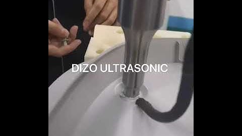 Plastic riveting machine