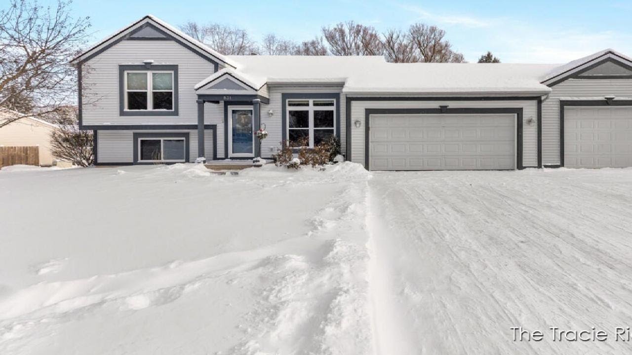831 Scott Woods Drive NE, Comstock Park, MI Presented by The Tracie Rich Team.