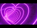 Slowly Moving Through Wavy Colorful Purple Pink Neon Heart 3D Tunnel 4K Background VJ Video Effect