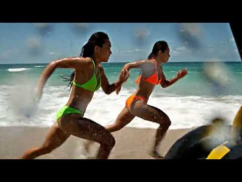 Woman in Action On The Beach