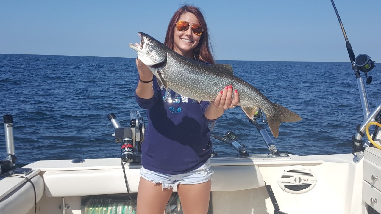 Beautiful Woman catches lake trout YouTube