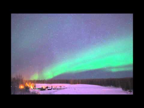 Northern lights in the starry sky from Fairbanks, ...