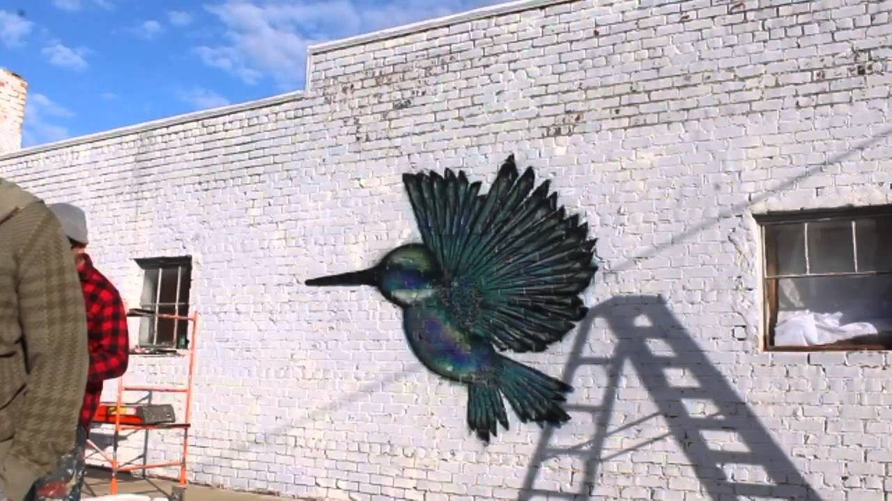 Painters get to work in the Douglas Design District