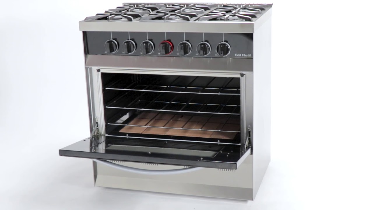 Cocina Mini Sol Real 516V (R) Color Rojo 4 Hornallas con puerta de vidrio  templado y rejas de fundición - Ficha de Producto