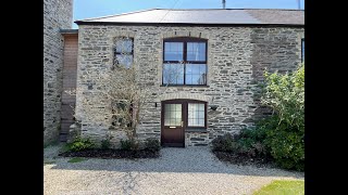 The Courtyard, Penmount, Truro  A stylish two bedroom end of terrace house with carport...