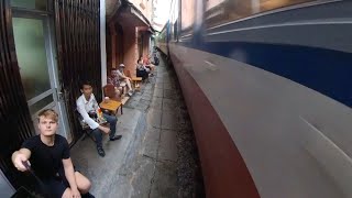 The train that blasts thru the middle of a bar explained!