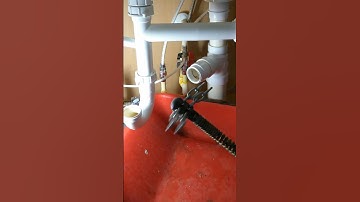 Snaking a kitchen sink drain blockage 💦 #plumbing  #plumber #shortscreator