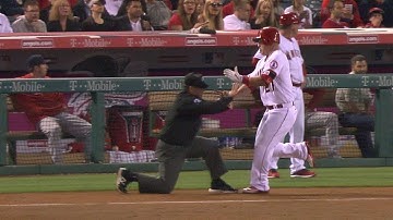 Trout knocks over umpire going to first