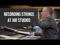 Behind the scenes at an air studios recording session