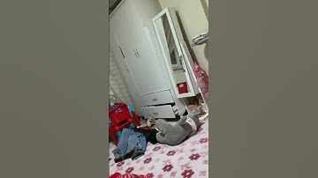 Person in Apartment Filming as the Building Shakes Due to an Earthquake