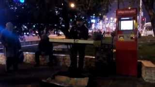 Krasnodar street rock live musician play his own song on keyboard