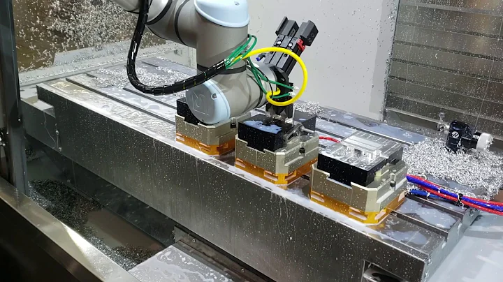 UR Collaborative Robot Feeding a Haas VF-4 Mill