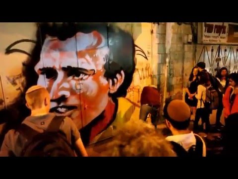 Jerusalem Graffiti Artist - Solomon Souza paints Uri Mamilan