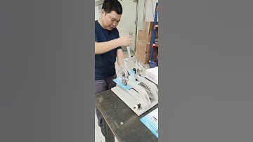 Double head manual eyelet making machine