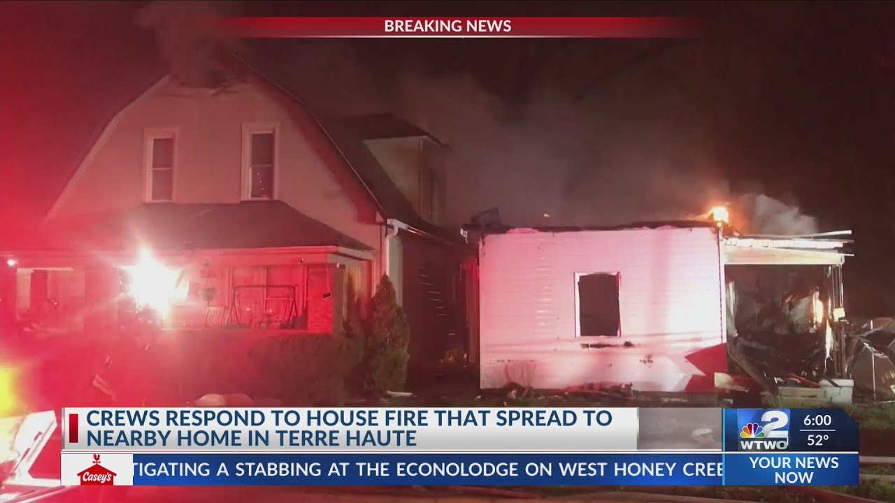 Three displaced by overnight fire that spread to second home - YouTube