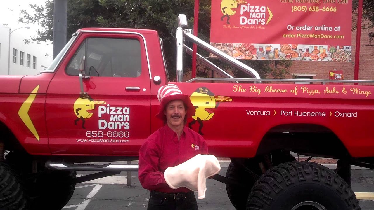 tossing pizza on a