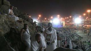 Muslim pilgrims climb Arafat for peak of hajj