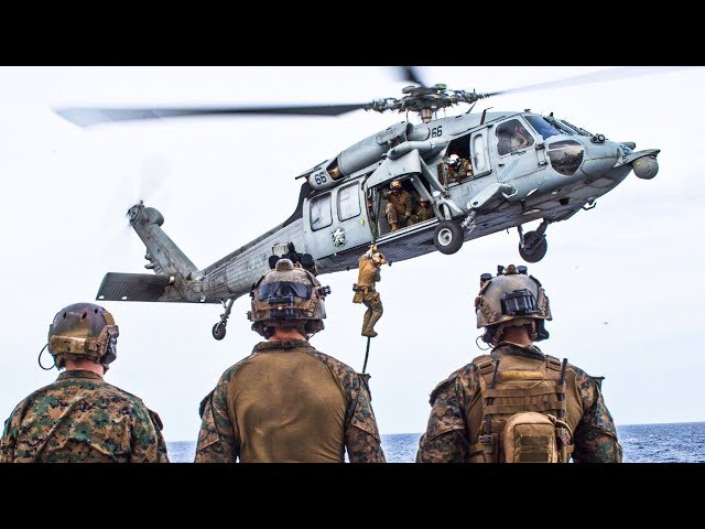 Fast Rope Onto A Ship From A UH-60 Black Hawk helicopter 