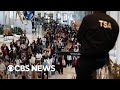 Videos show long TSA lines wrapping around airport terminals across U.S.