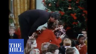 President Reagan and First Lady Nancy Reagan light White House Christmas Tree in 1981