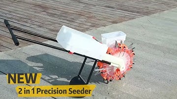 Hand push seeder with fertilizer .