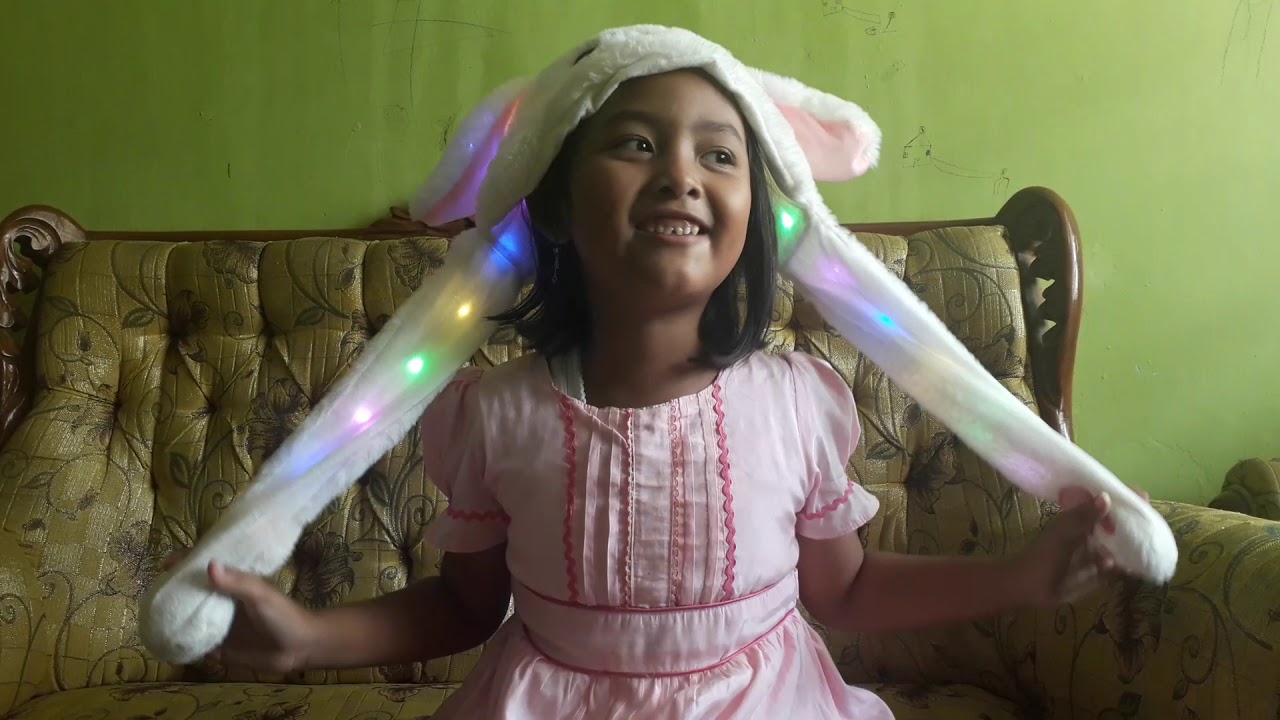 Unboxing topi  kelinci  bergoyang led  menyala head bunny 