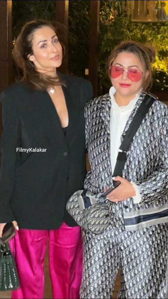 Sisters forevaa #malaikaarora #amritaarora rocking their respective hues ?? #filmykalakar