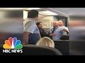 American Airlines Flight Attendant Suspended After Incident Caught On Camera | NBC News