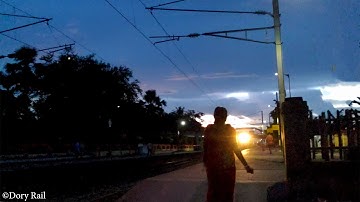 Sea Green EMU and Old Green EMU local Train crossing at evening