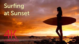 Surfing at sunset