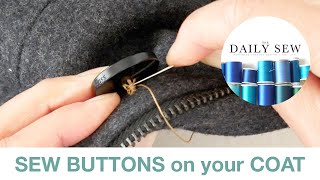 The Key to Sewing Coat Buttons On