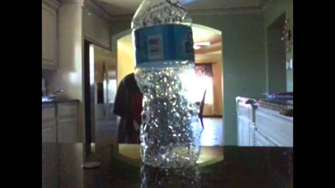 Penny through water bottle magic trick YouTube
