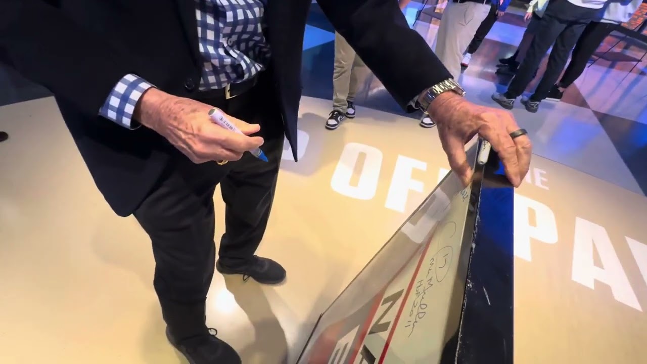 Hall of Famer Coach Del Harris signs the original basketball hall of fame sign